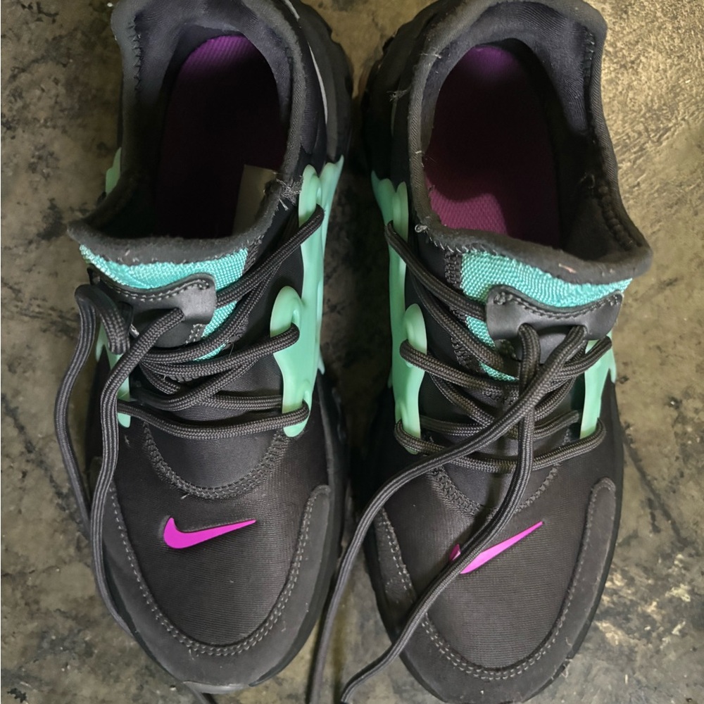 Nike Black Sneakers with Teal Accents and Purple Swoosh